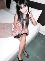 Busty Thai girl Beer gives up her shaved pussy to a sex tourist in hotel room