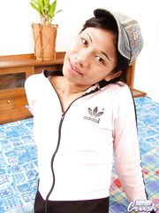 Asian shemale Natalee gets completely undressed before gives blowjob